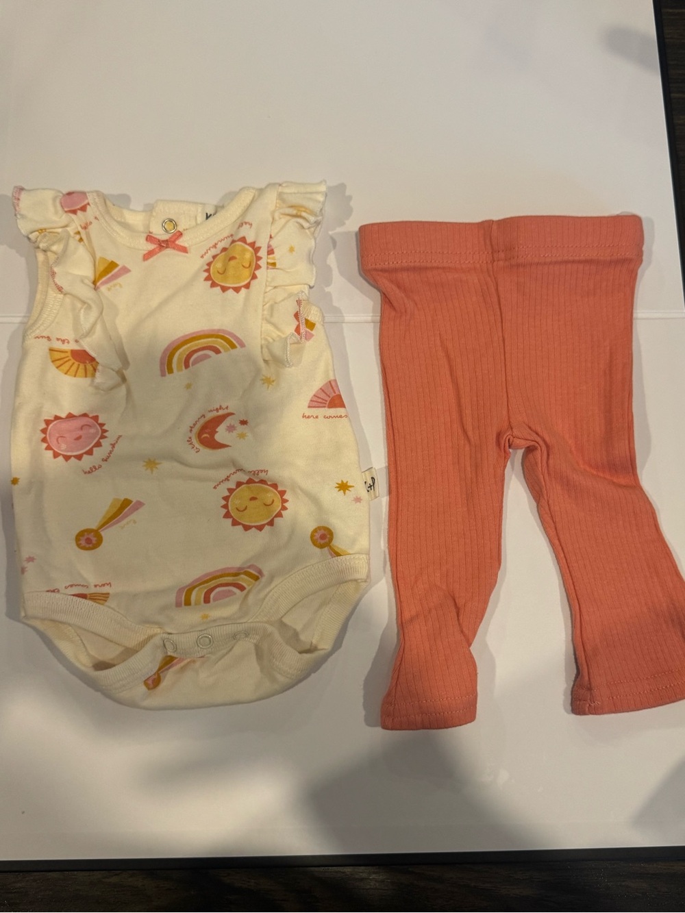 Kit + Pearl Sunshine Print Cream Baby Onesie with Coral Ribbed Pants